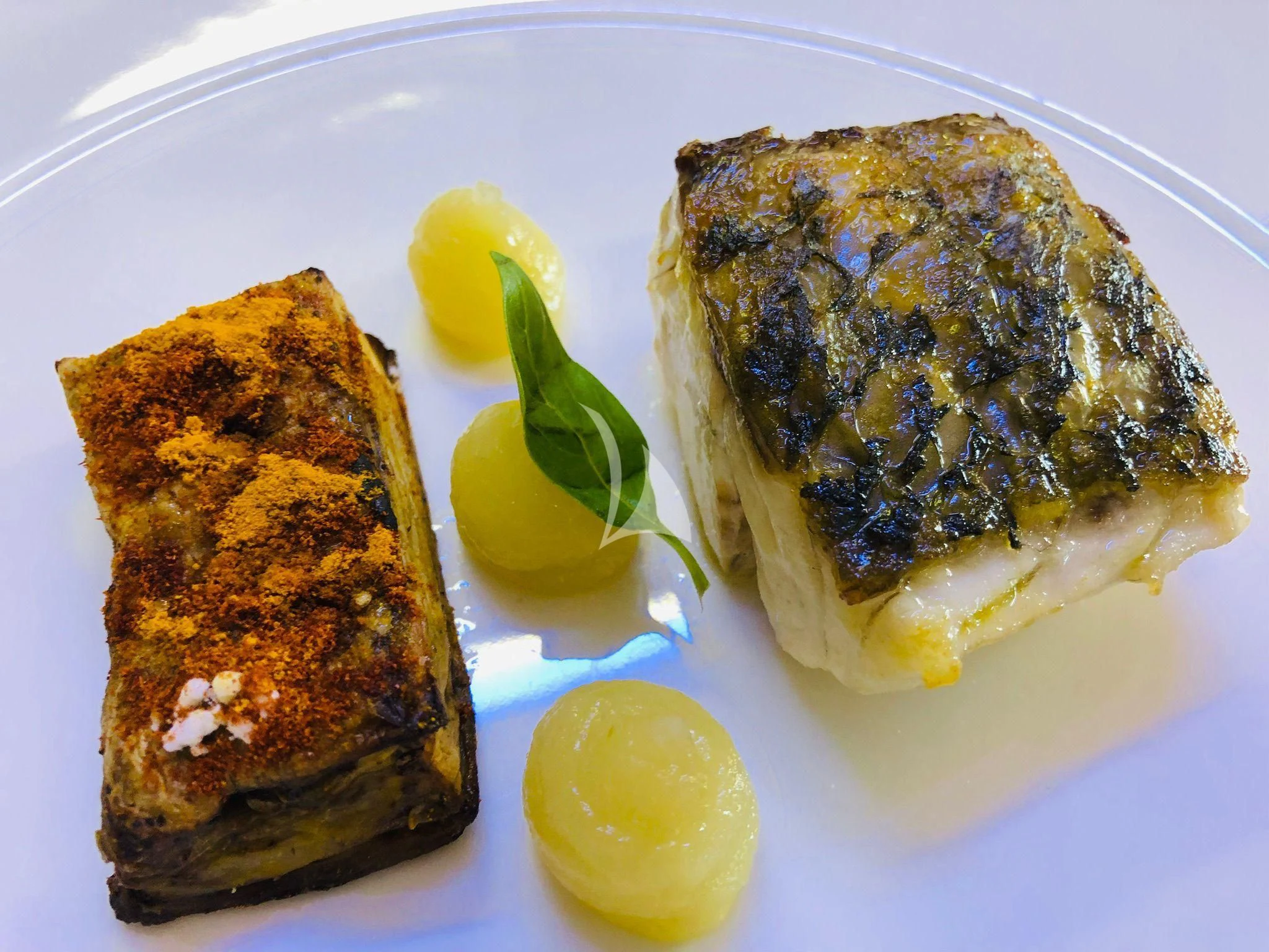 a plate of food aboard ANGRA TOO Yacht for Sale