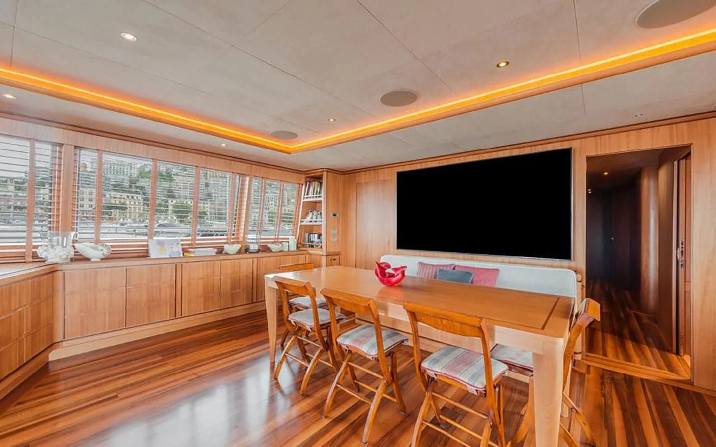 a room with a table and chairs aboard ANGRA TOO Yacht for Sale