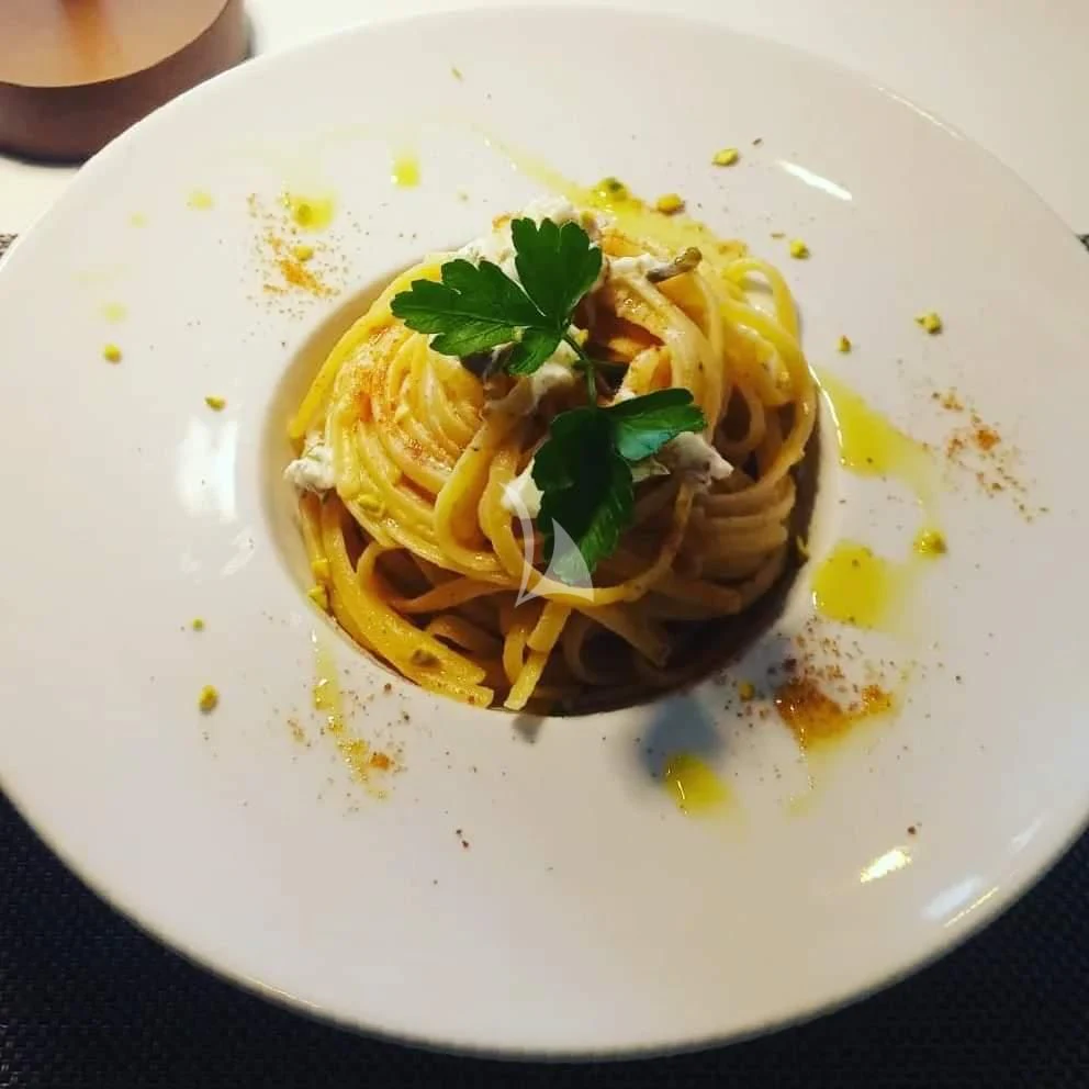 a plate of food aboard ANGRA TOO Yacht for Sale