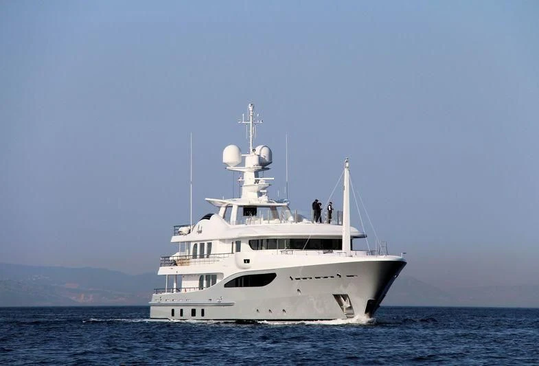 a white boat in the water aboard APOLLO Yacht for Sale
