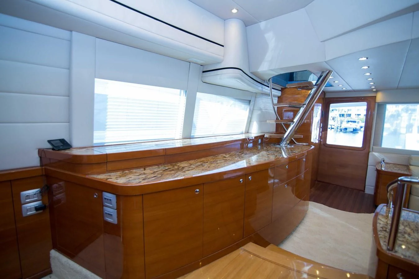 a kitchen with a large island aboard PREDATOR Yacht for Sale