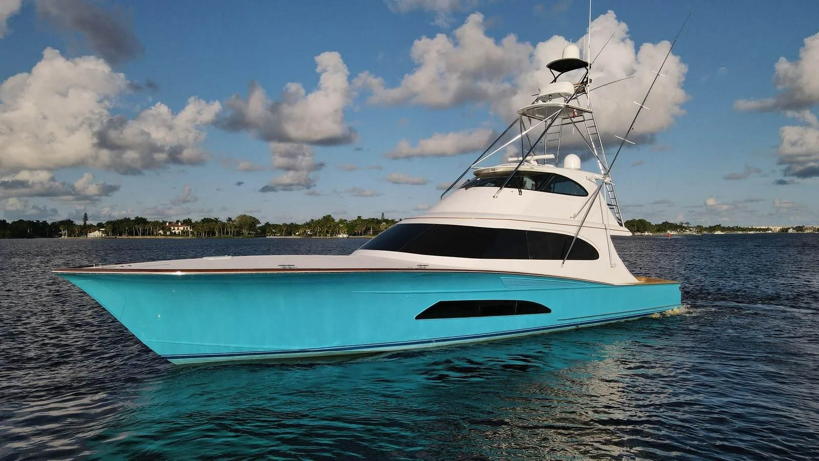 a white yacht on the water aboard PREDATOR Yacht for Sale