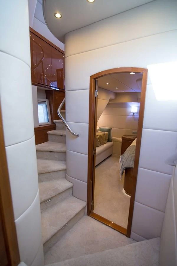 a hallway with a glass door aboard PREDATOR Yacht for Sale