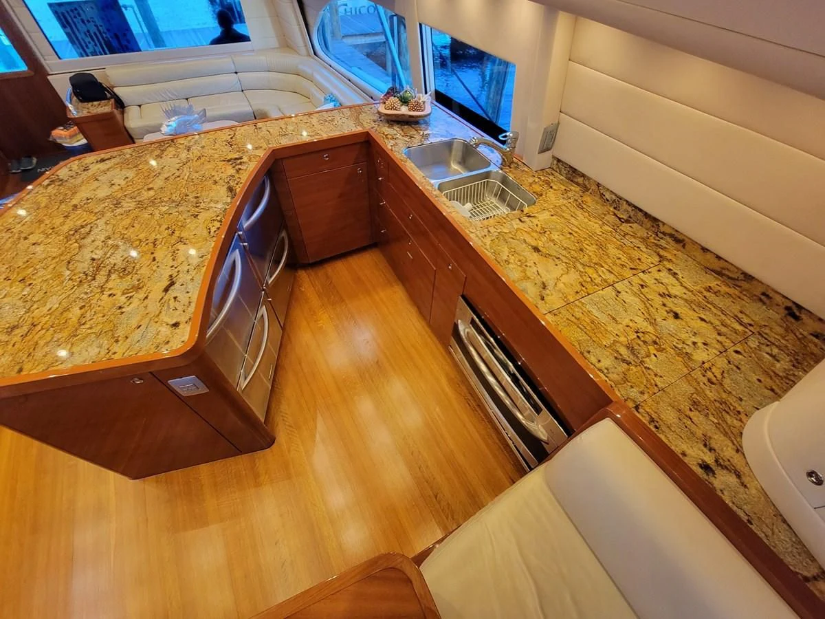 a kitchen with a large counter aboard PREDATOR Yacht for Sale