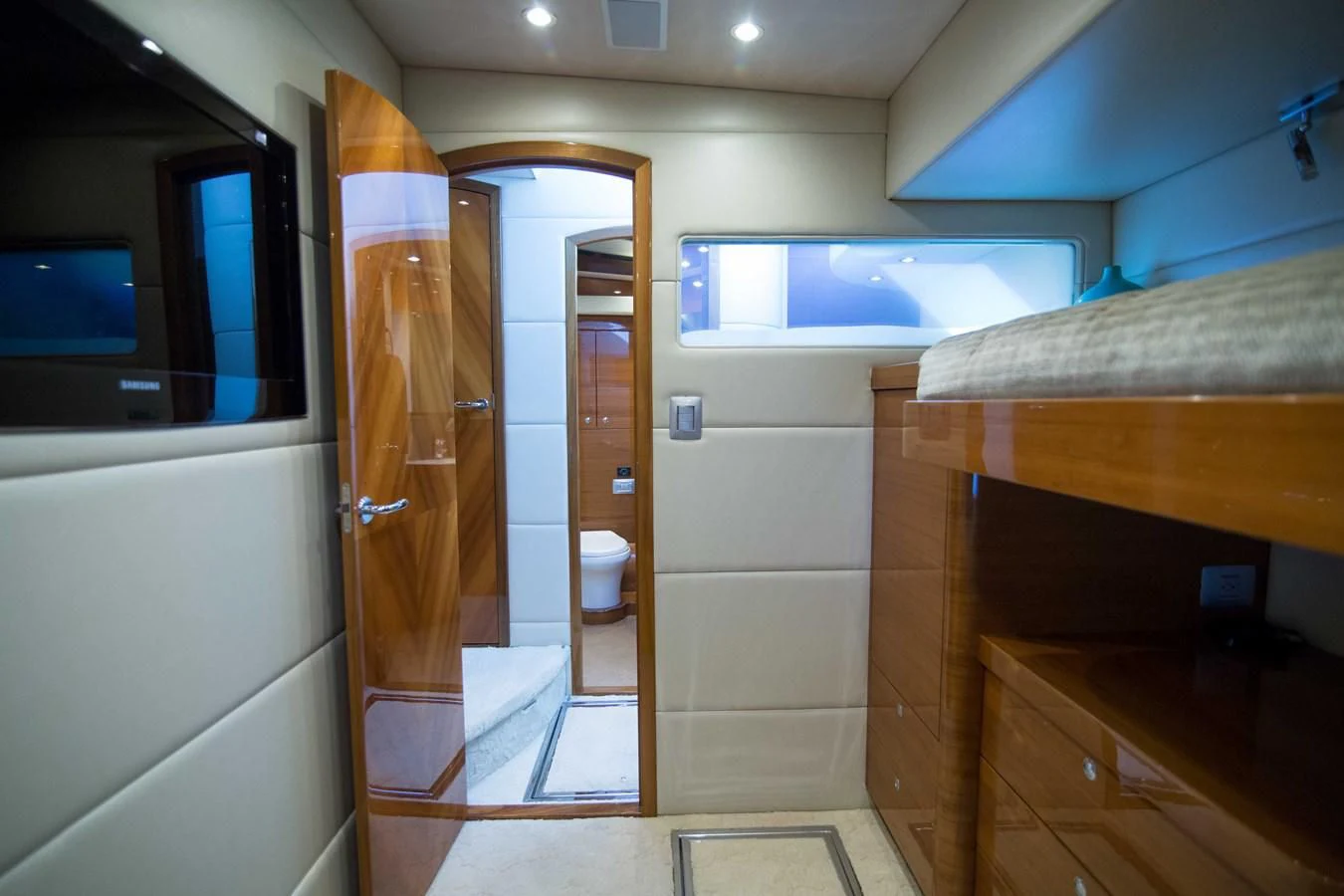 a bathroom with a glass shower aboard PREDATOR Yacht for Sale