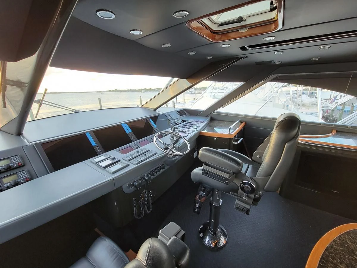 inside of a car aboard PREDATOR Yacht for Sale