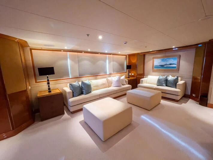 a room with a couch and a tv aboard ALAMSHAR Yacht for Sale