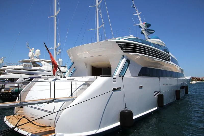 a white yacht docked aboard ALAMSHAR Yacht for Sale