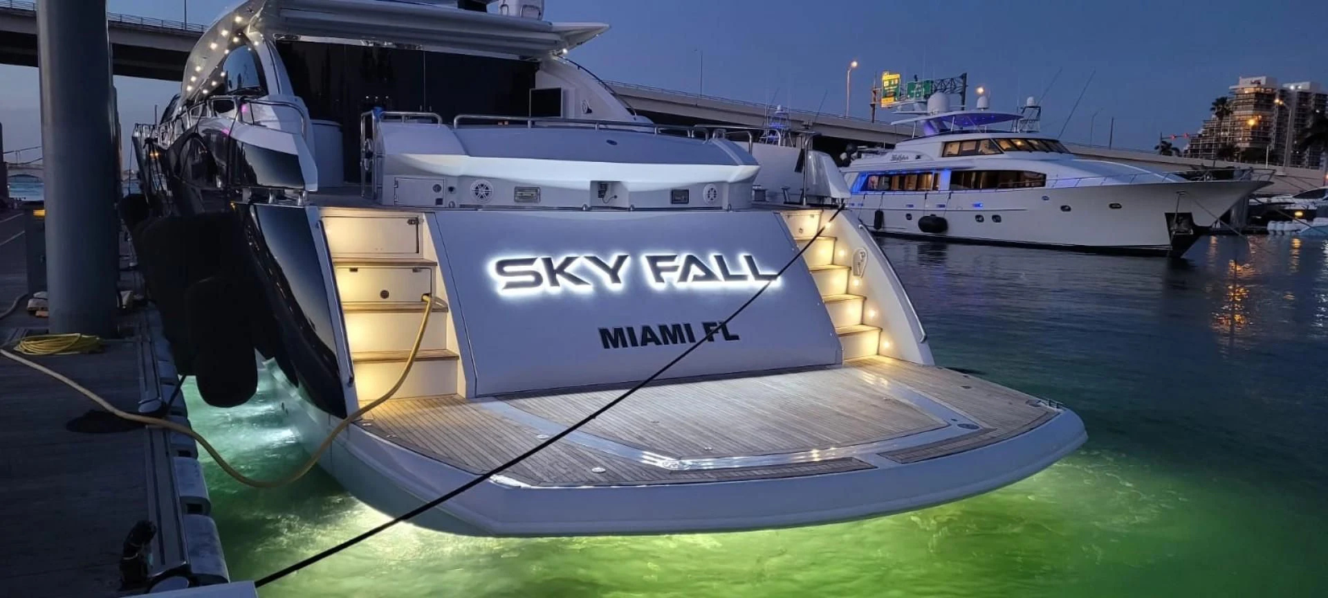 a boat docked at a pier aboard SKY FALL Yacht for Sale