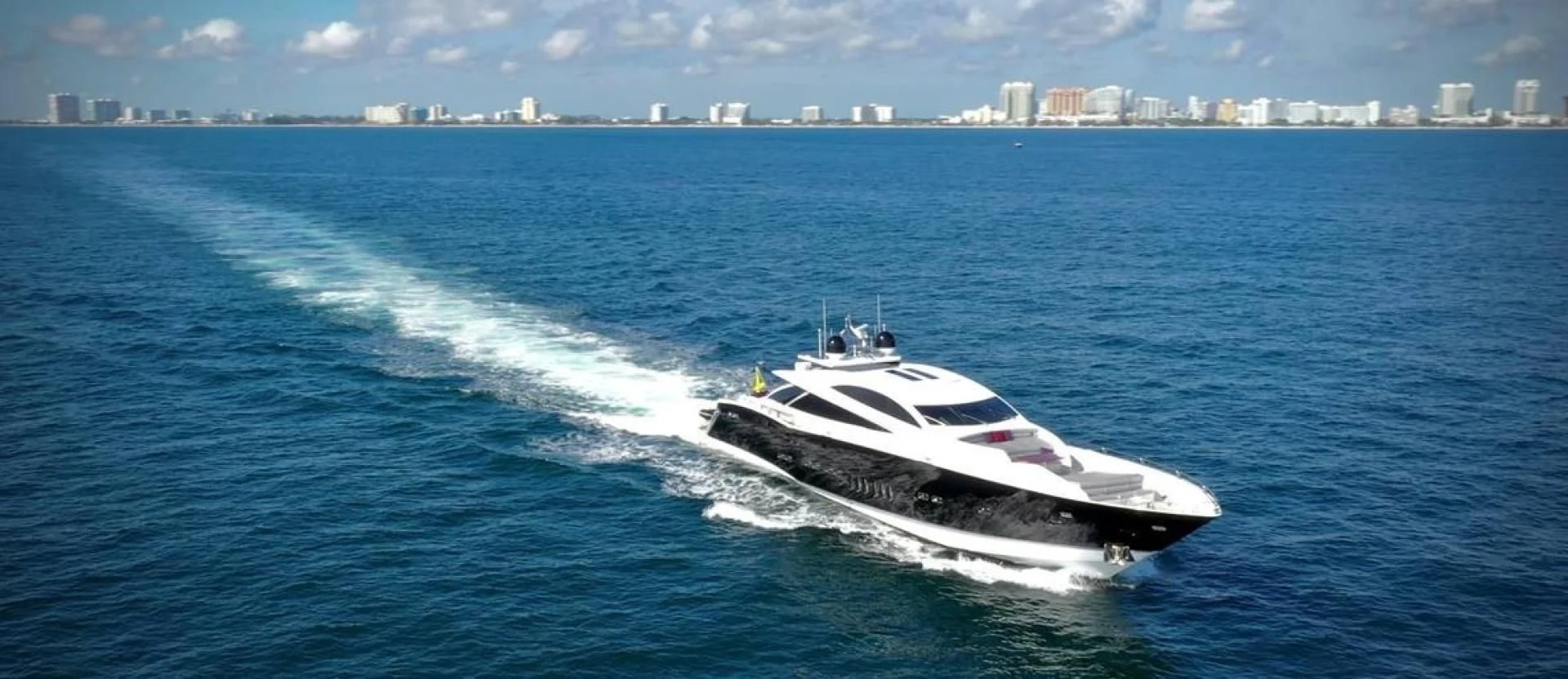 a white yacht on the water aboard SKY FALL Yacht for Sale