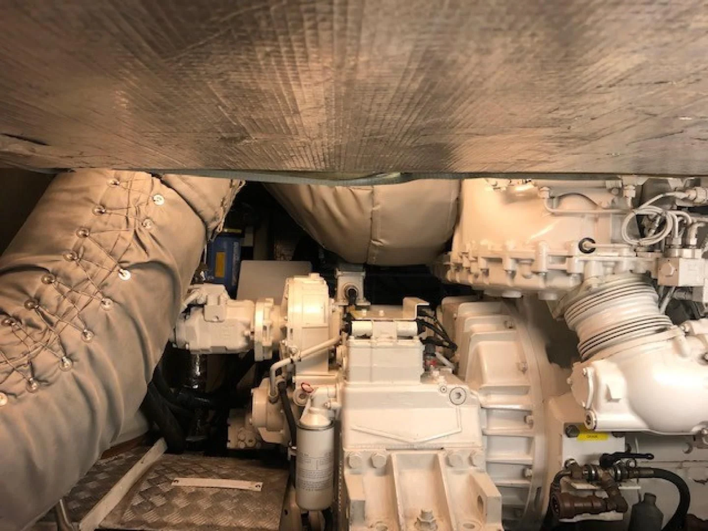 a vehicle with a large piece of machinery in it aboard SKY FALL Yacht for Sale