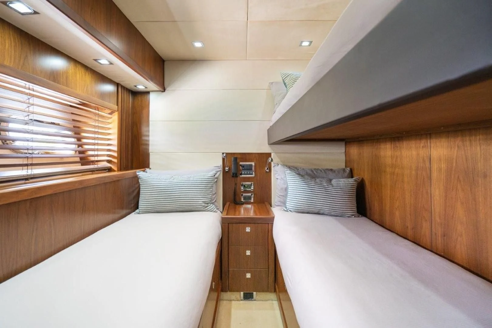 a room with two beds aboard SKY FALL Yacht for Sale