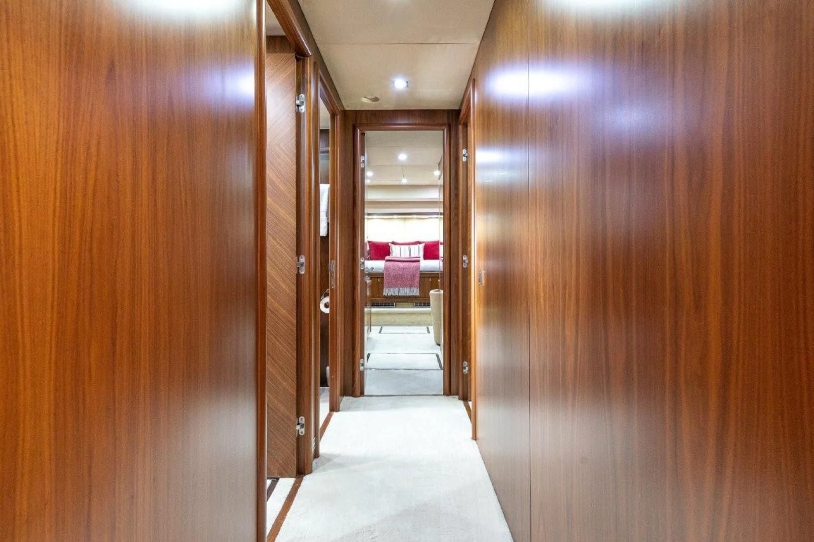 a hallway with wooden doors aboard SKY FALL Yacht for Sale