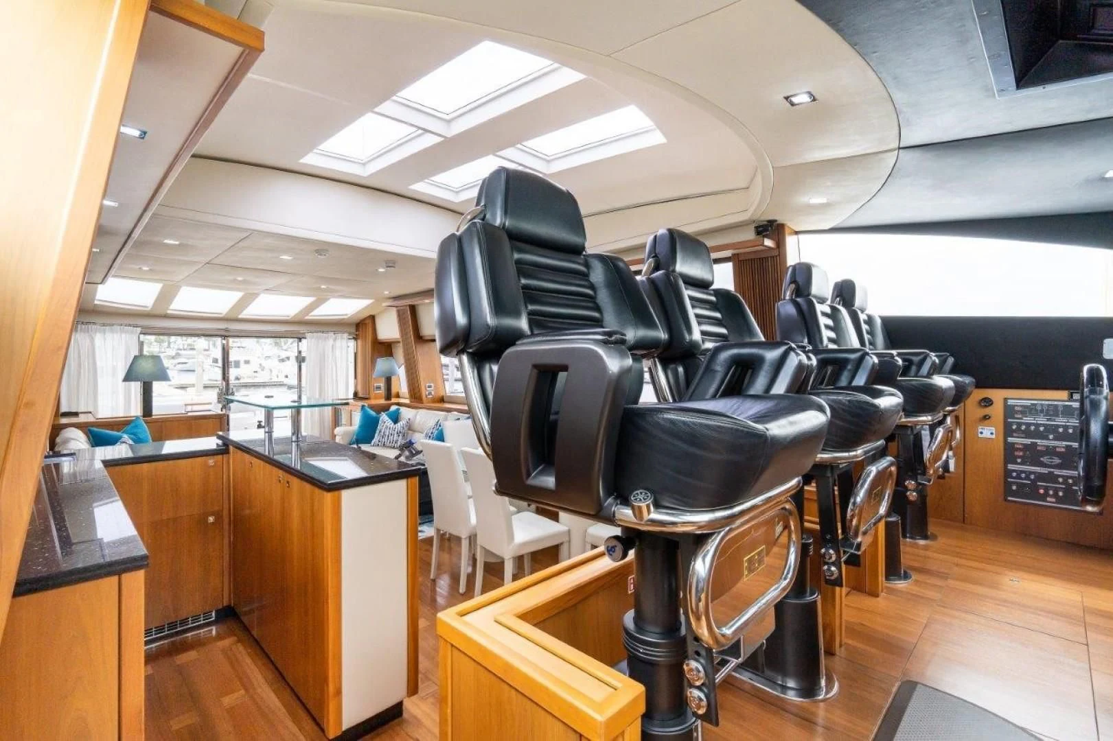 a room with many chairs and desks aboard SKY FALL Yacht for Sale
