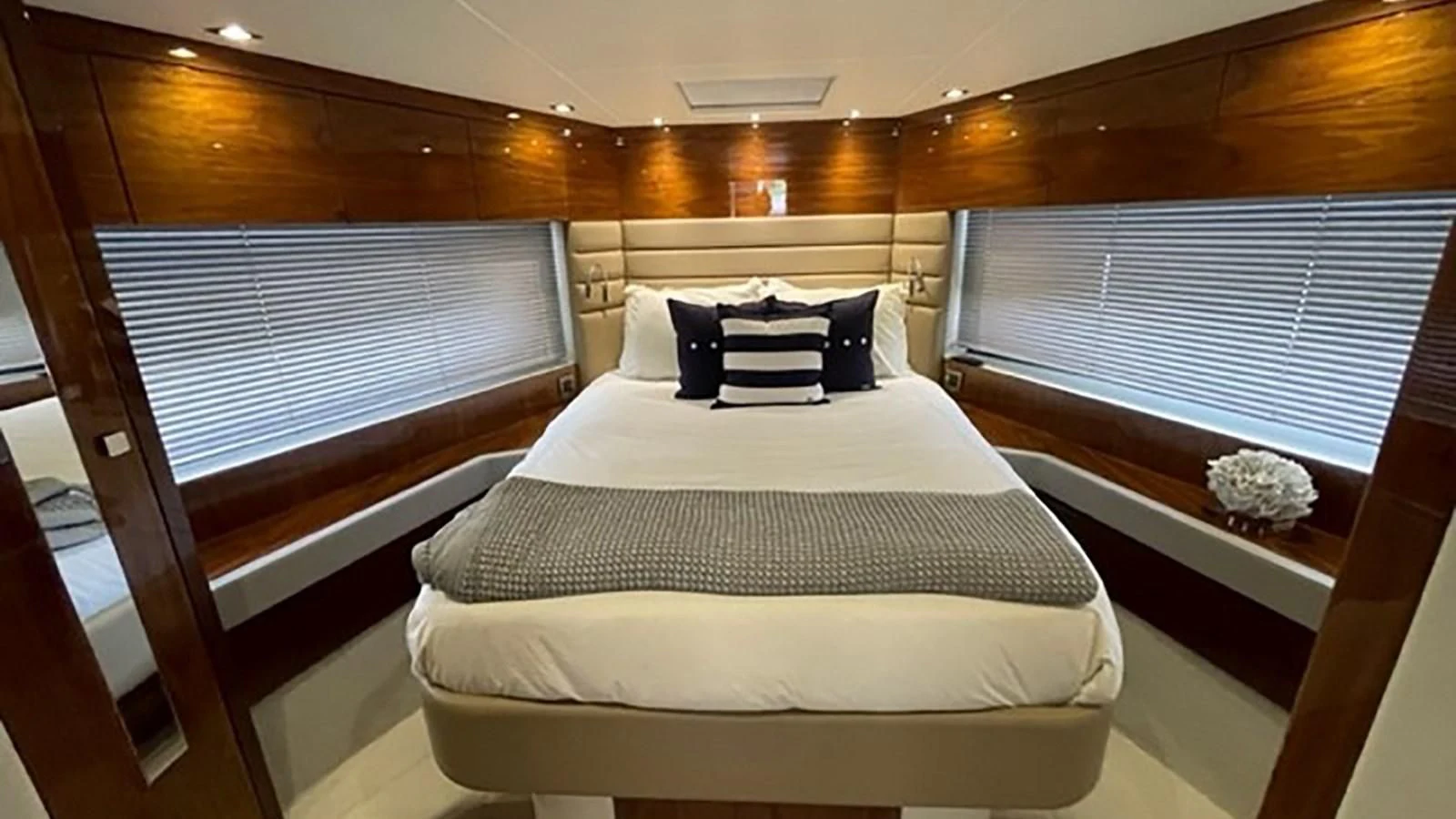 a bed in a room aboard EXIT Yacht for Sale