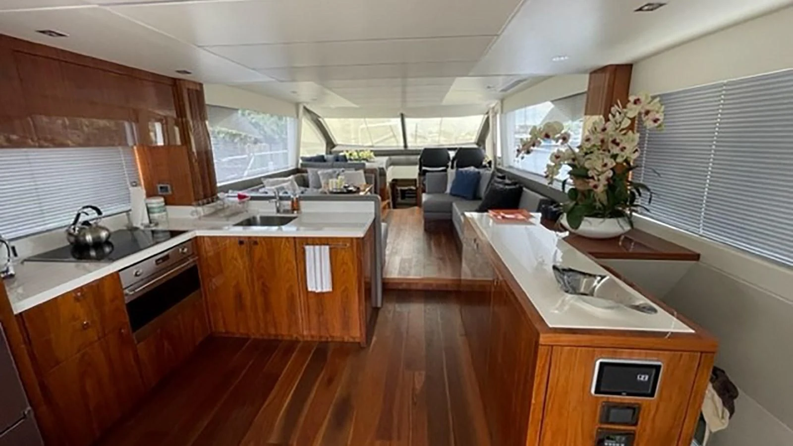 a kitchen with a large island aboard EXIT Yacht for Sale