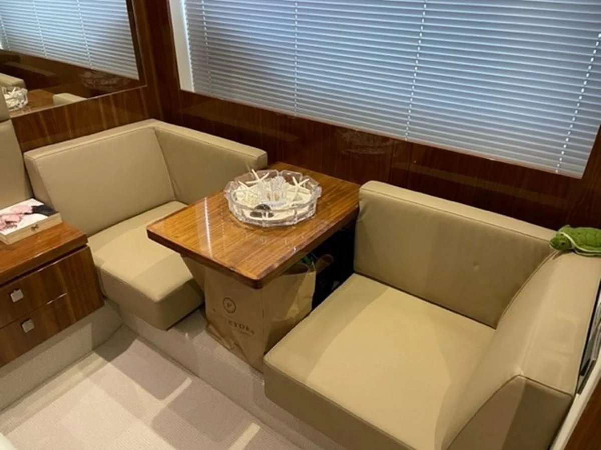 a bathroom with a tub sink and a toilet aboard EXIT Yacht for Sale