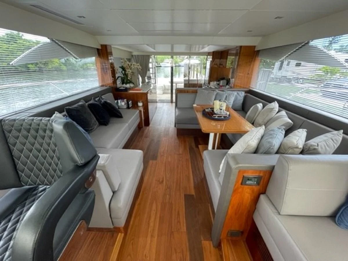 a living room with a large window aboard EXIT Yacht for Sale
