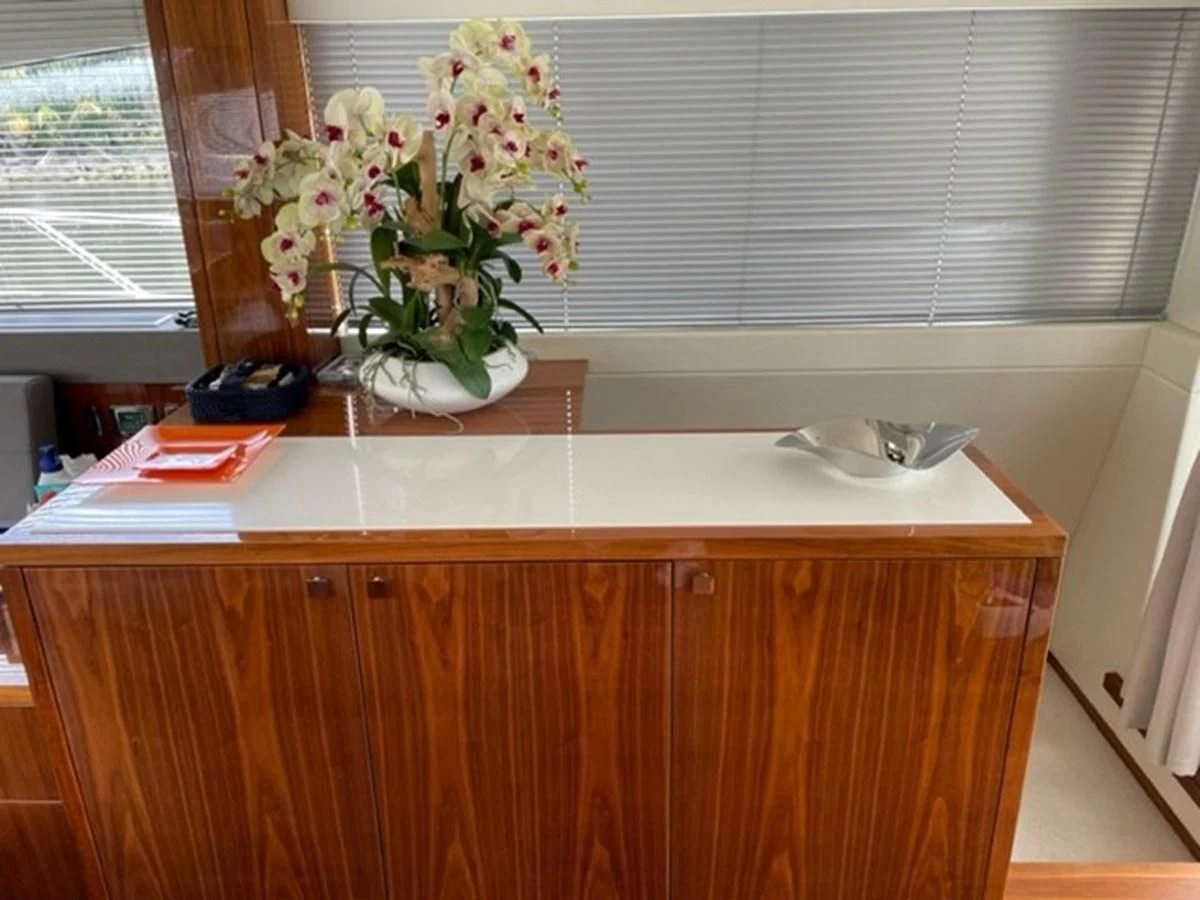 a vase of flowers on a counter aboard EXIT Yacht for Sale