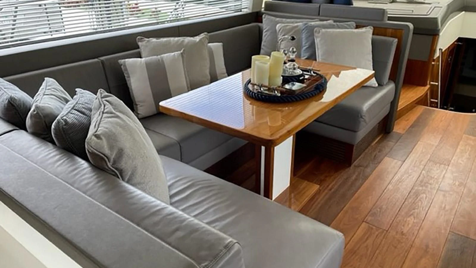 a couch and a coffee table aboard EXIT Yacht for Sale