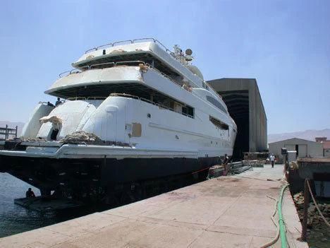 a large ship docked aboard OCEAN 1 Yacht for Sale