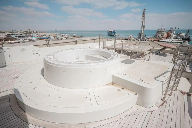 a white pool with a white roof aboard OCEAN 1 Yacht for Sale
