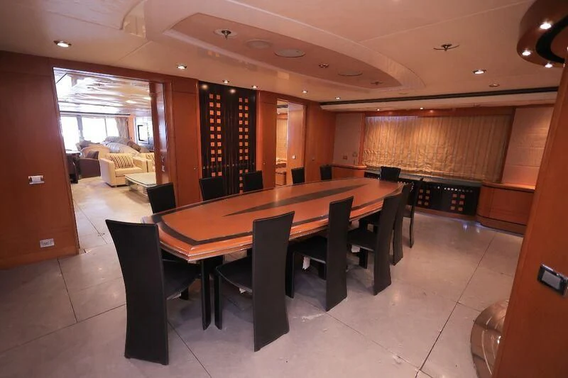 a large conference room with a table and chairs aboard OCEAN 1 Yacht for Sale