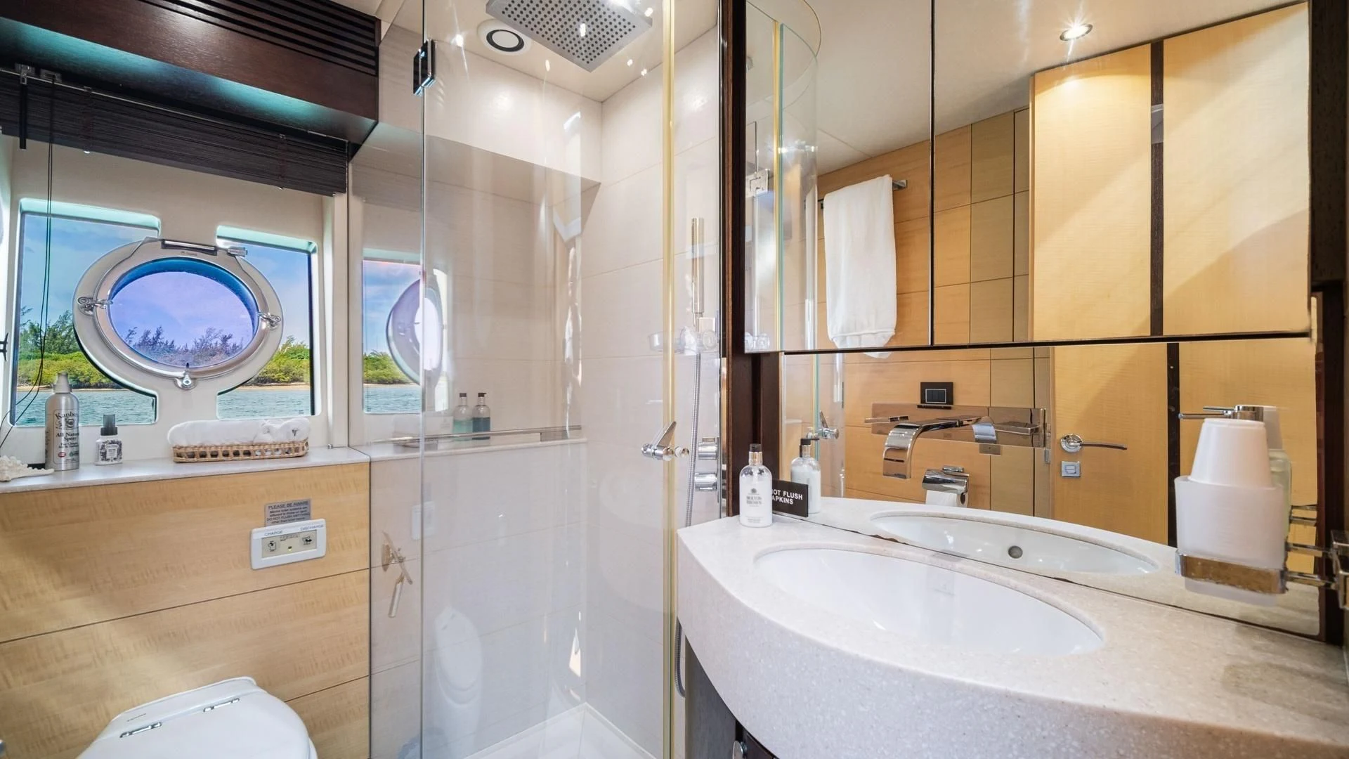 a bathroom with a large mirror aboard WOODEVER Yacht for Sale