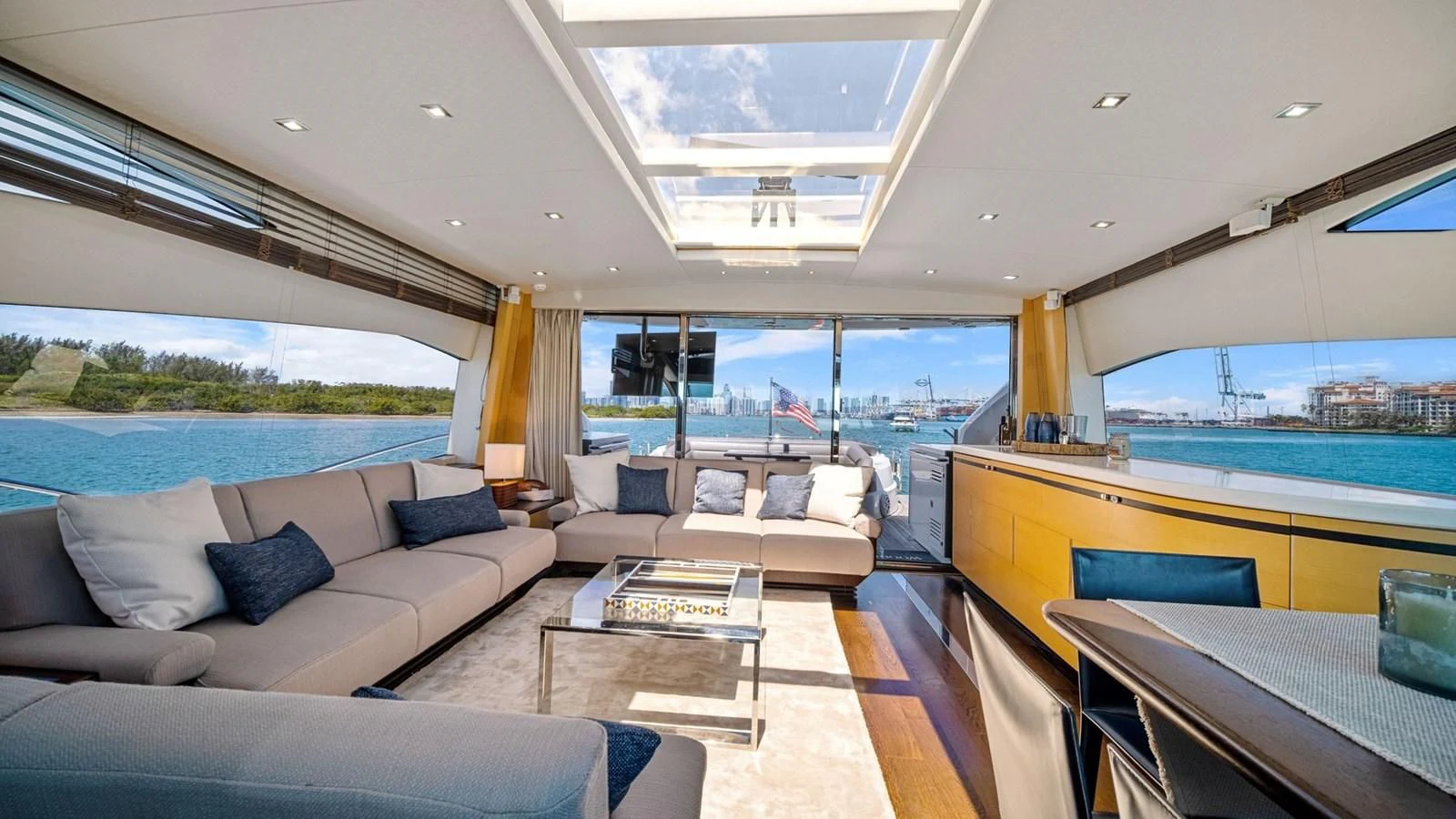 a living room with a large window aboard WOODEVER Yacht for Sale