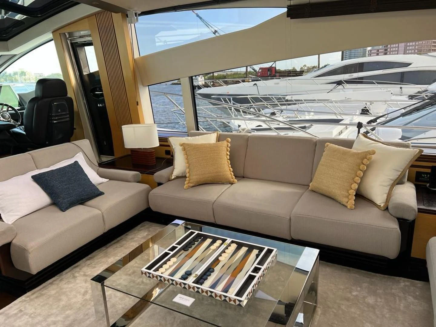 a living room with a large window aboard WOODEVER Yacht for Sale