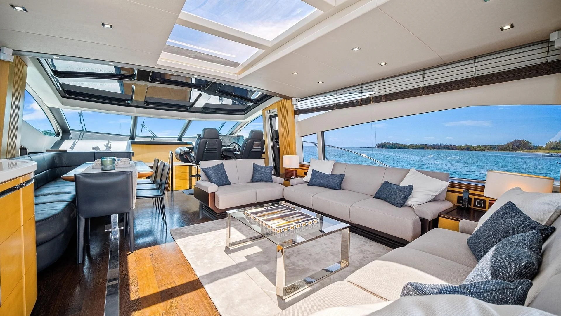 a living room with a large window aboard WOODEVER Yacht for Sale