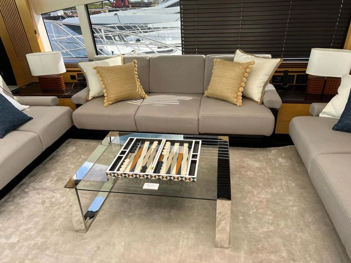 a living room with a couch and a coffee table aboard WOODEVER Yacht for Sale