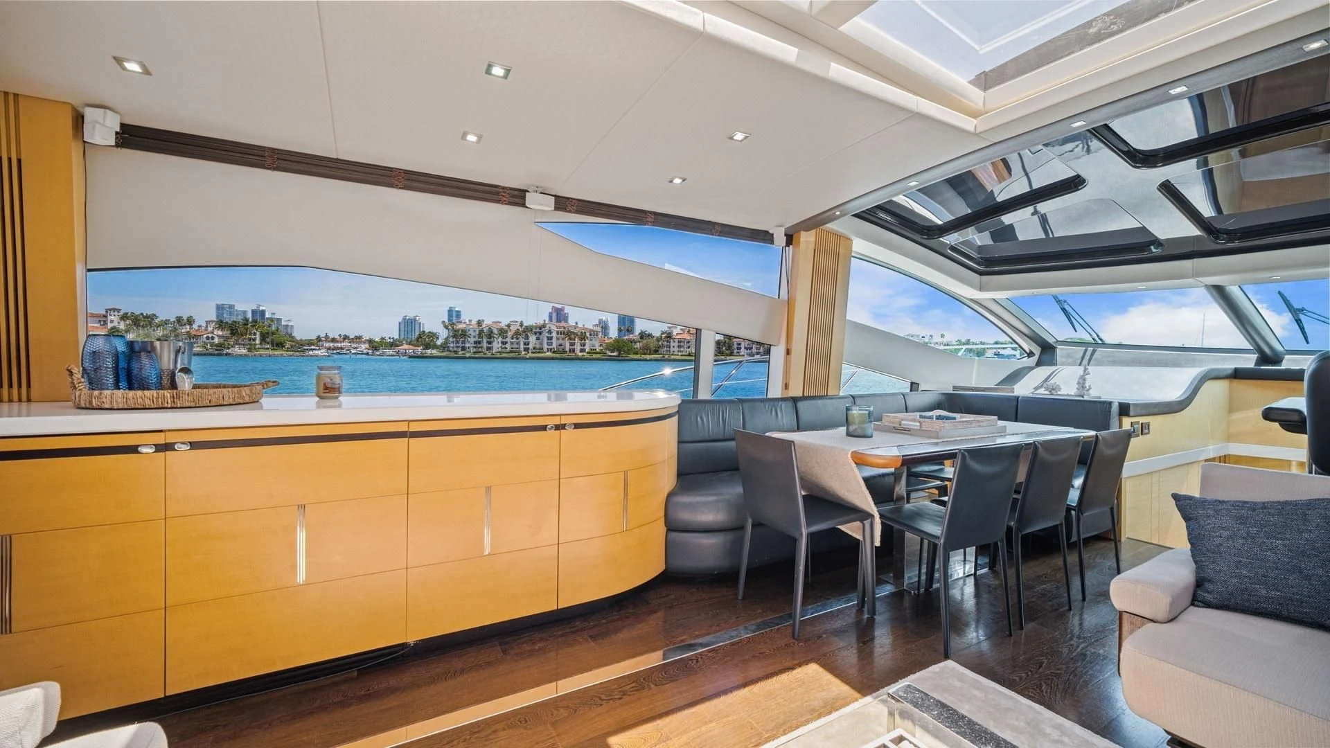 a room with a table chairs and a large window aboard WOODEVER Yacht for Sale