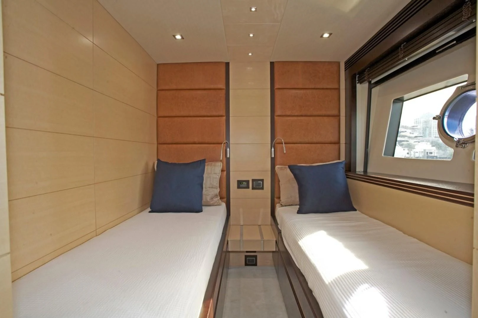 a room with two beds aboard WOODEVER Yacht for Sale