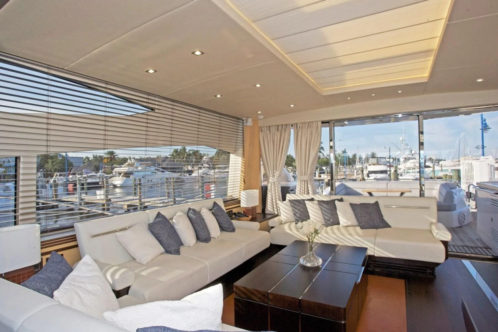 a living room with a large window aboard WOODEVER Yacht for Sale