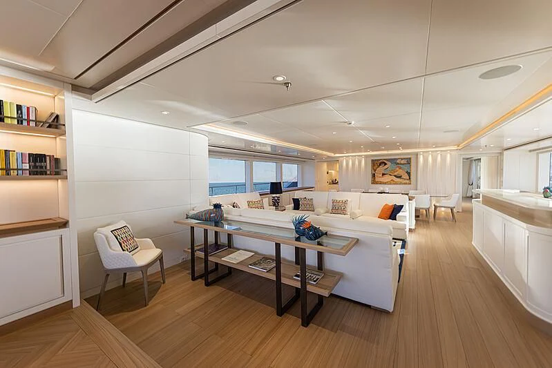 a large living room with a large window aboard FRAMURA Yacht for Sale