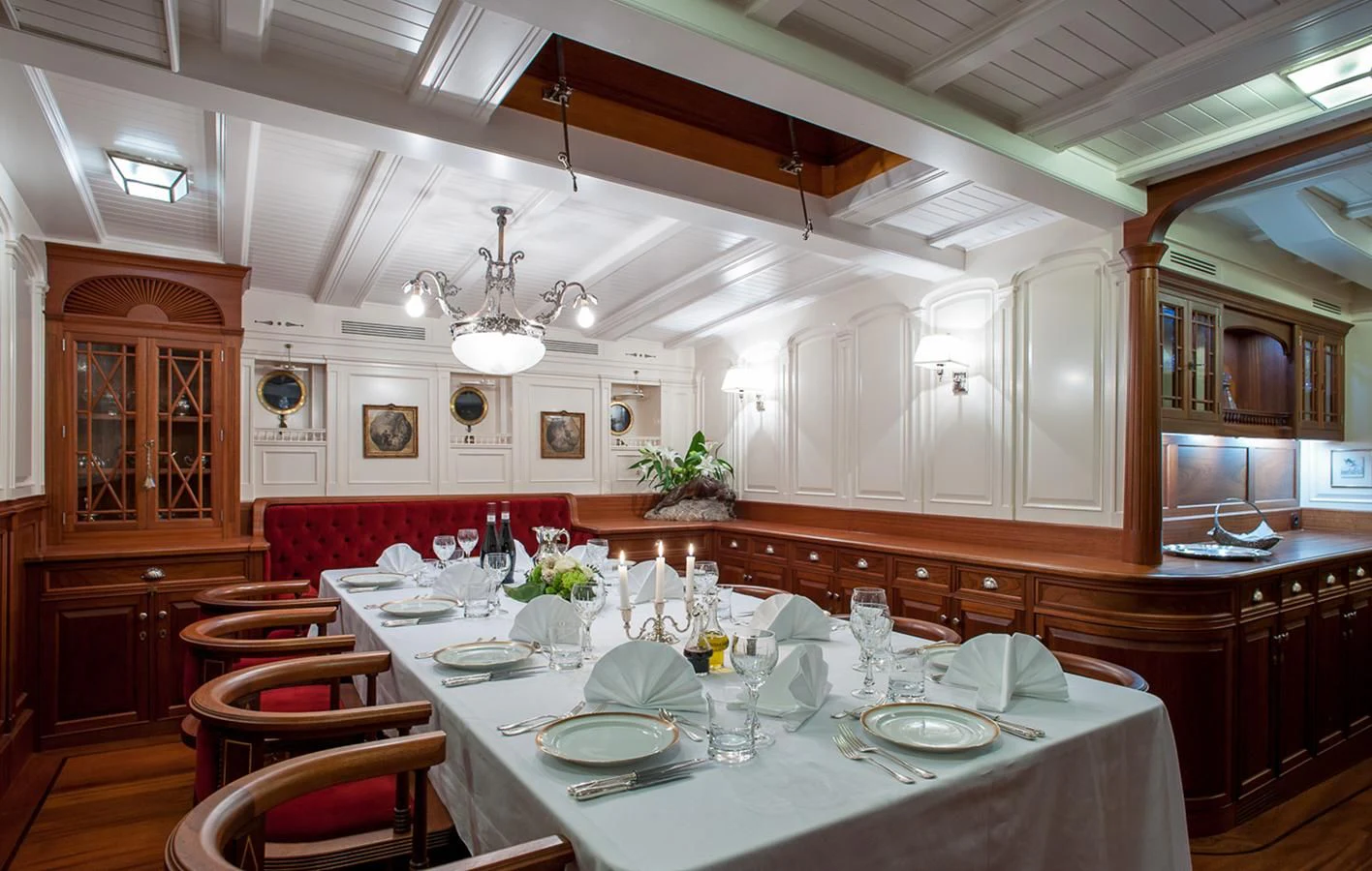 a dining room with a table set aboard ATLANTIC Yacht for Charter