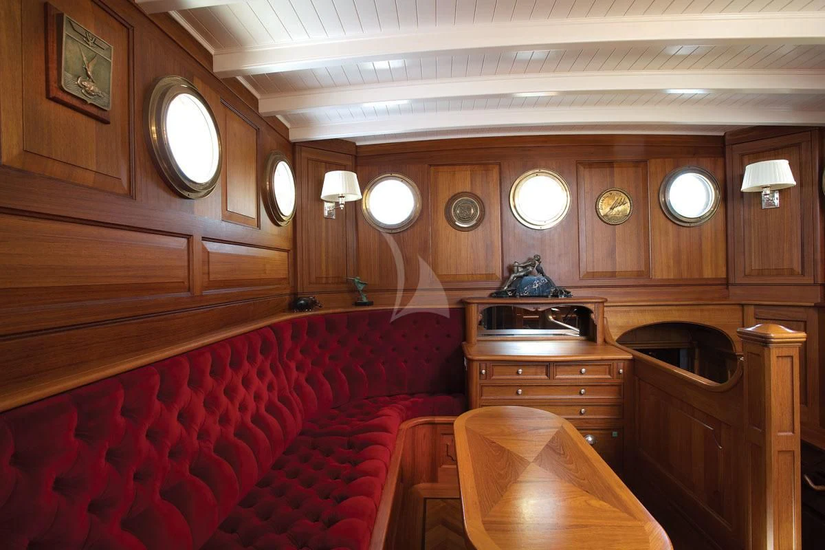 a room with wooden furniture aboard ATLANTIC Yacht for Charter