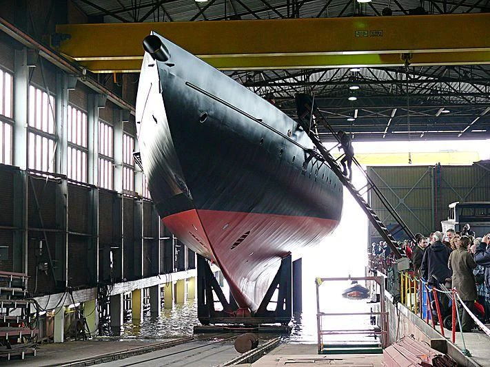 a large airplane in a warehouse aboard ATLANTIC Yacht for Charter