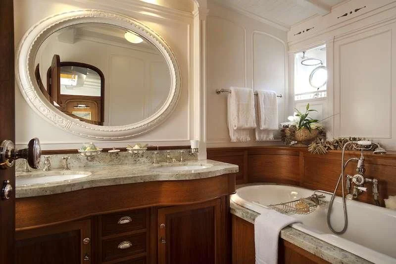 a bathroom with a large mirror aboard ATLANTIC Yacht for Charter