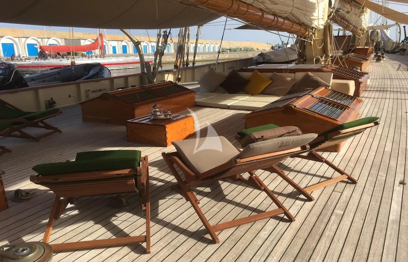 a group of wooden model boats aboard ATLANTIC Yacht for Charter