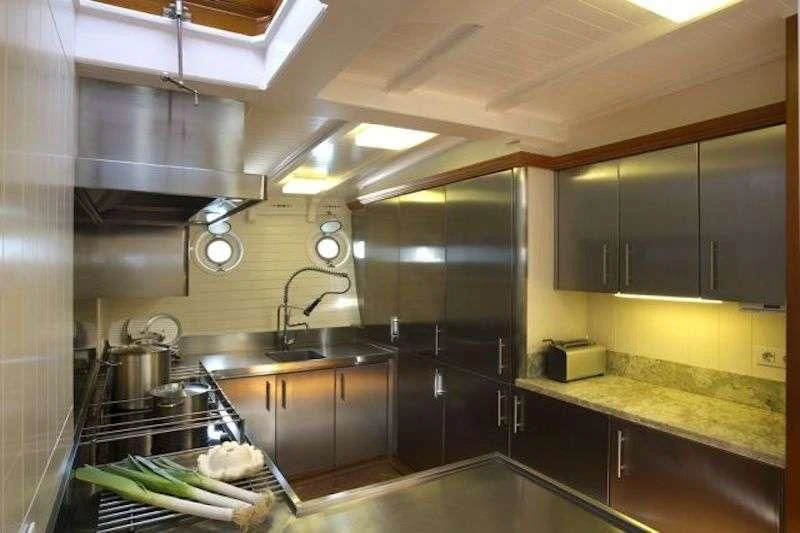a kitchen with a large stove aboard ATLANTIC Yacht for Charter