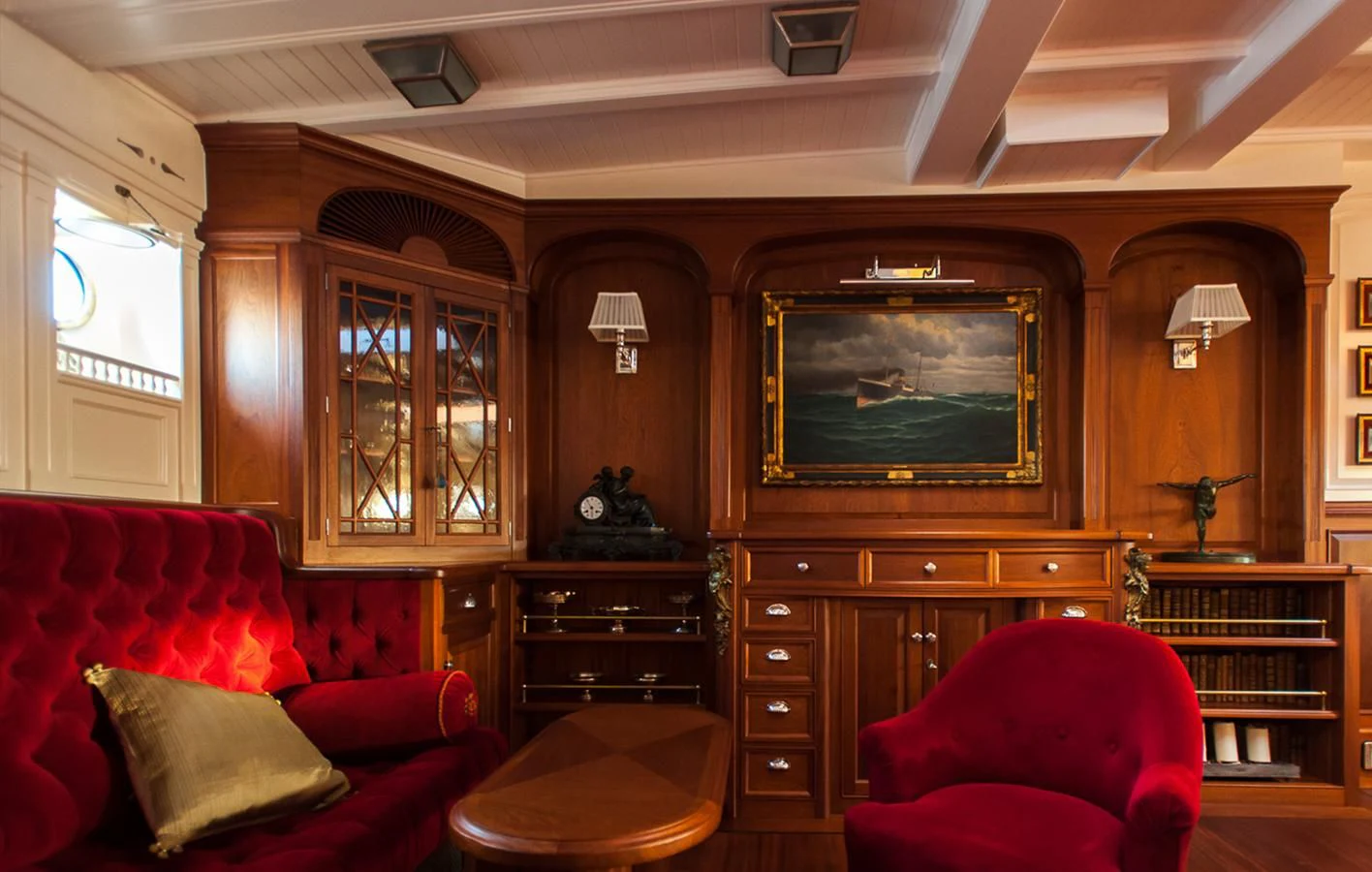 a living room with a tv and a couch aboard ATLANTIC Yacht for Charter