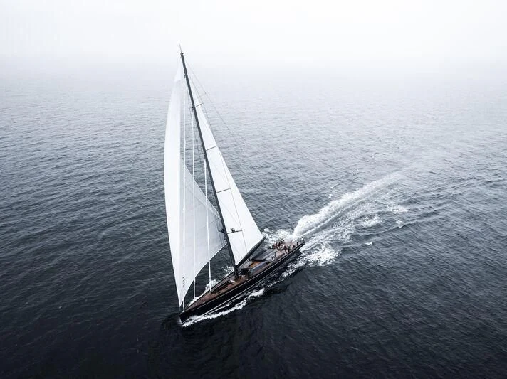 a boat sailing on the sea aboard NILAYA Yacht for Sale