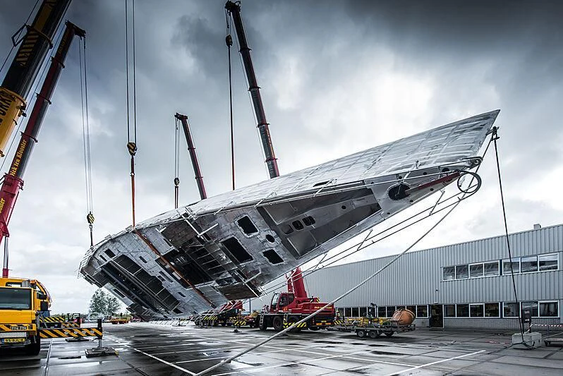 a large white boat docked aboard NILAYA Yacht for Sale