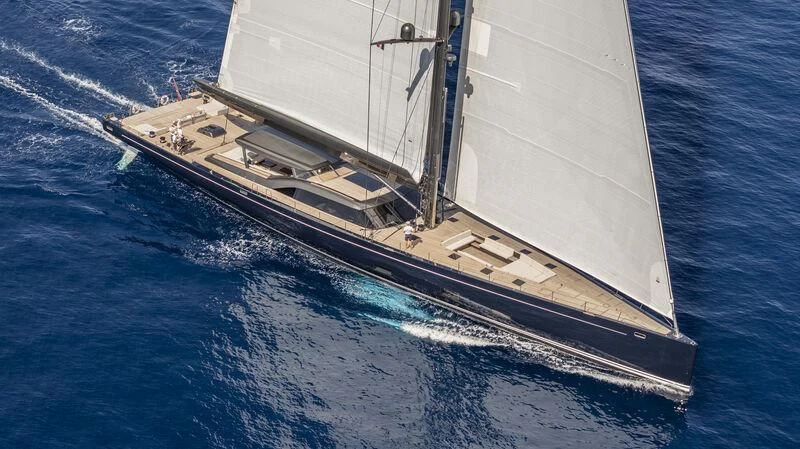 a large white boat on the water aboard NILAYA Yacht for Sale