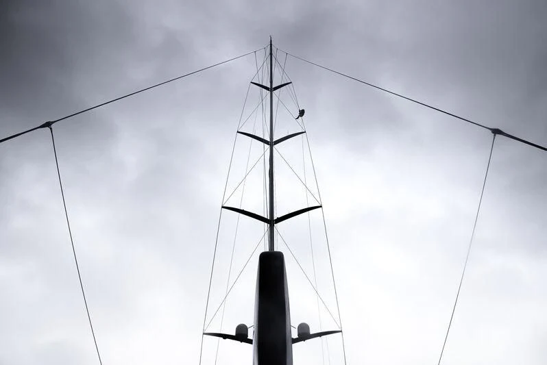 a large sailboat on a cloudy day aboard NILAYA Yacht for Sale