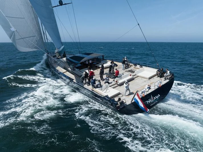 a group of people sailing on a boat aboard NILAYA Yacht for Sale