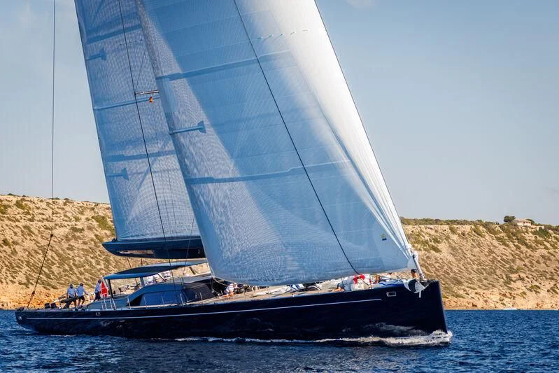 a boat sailing on the water aboard NILAYA Yacht for Sale