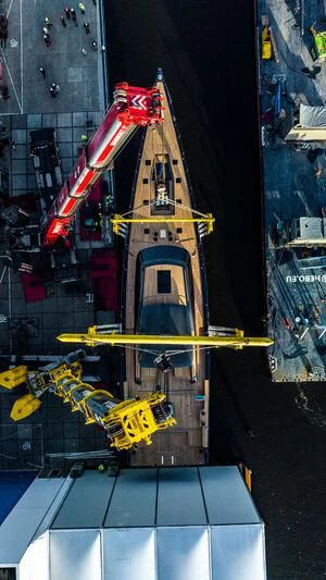 a large ship in a harbor aboard NILAYA Yacht for Sale